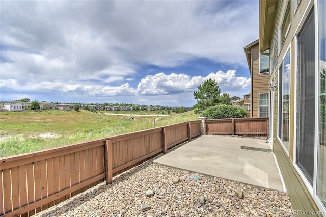 10597 Ashfield St, Highlands Ranch, CO 80126 - fenced backyard featuring a patio area
