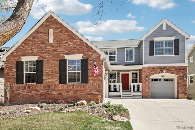 view of front of property featuring brick siding, an attached garage, and concrete driveway