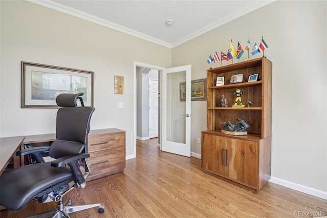 office space featuring french doors, light wood finished floors, ornamental molding, and baseboards