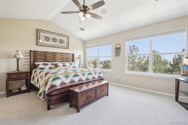 bedroom featuring lofted ceiling, light colored carpet, baseboards, and ceiling fan
