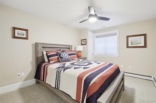 bedroom with carpet flooring, baseboards, and a ceiling fan