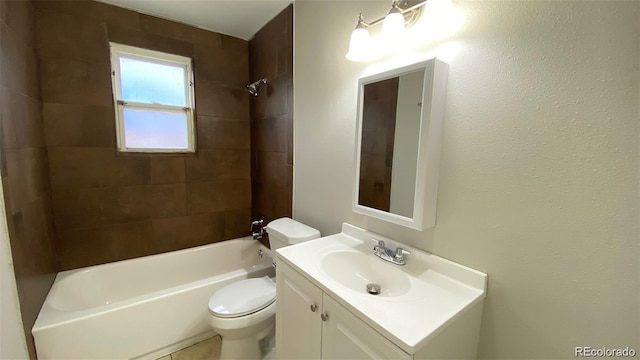 full bath featuring tub / shower combination, vanity, and toilet