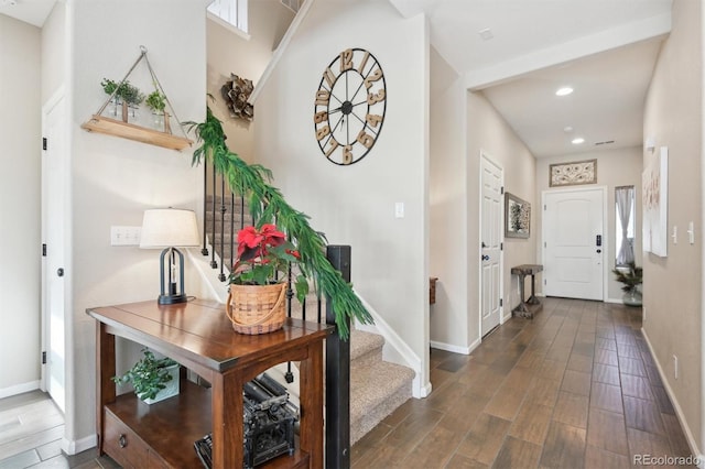 foyer with dark wood-type flooring