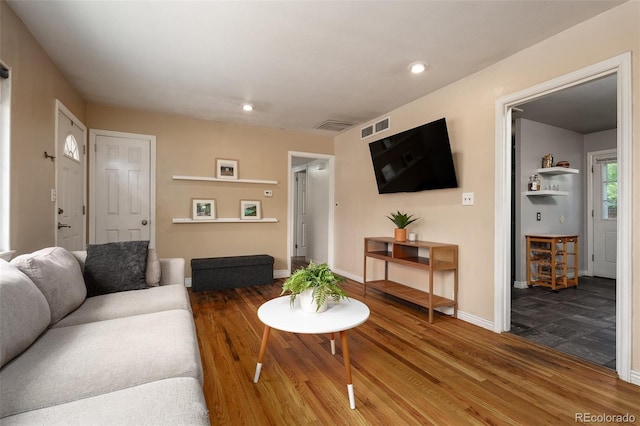 living room with hardwood / wood-style floors