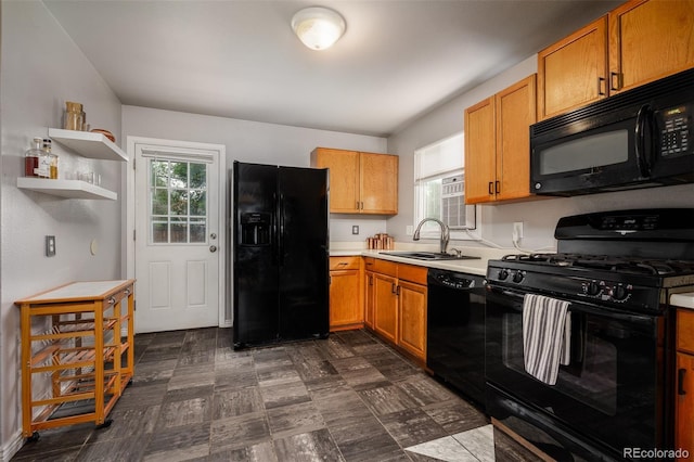 kitchen featuring black appliances and sink