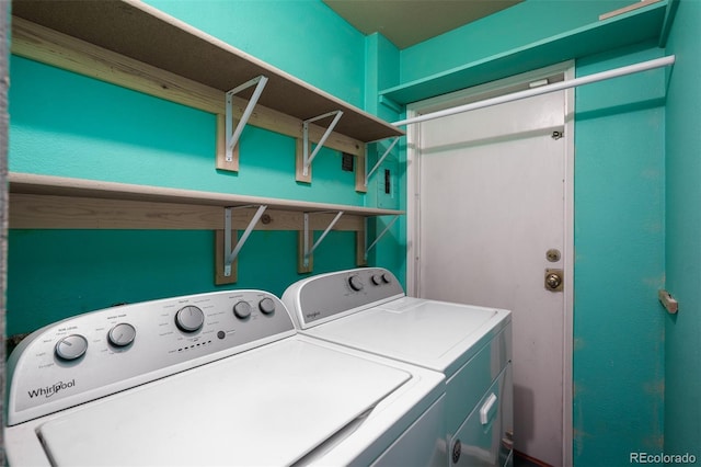 clothes washing area featuring washing machine and dryer