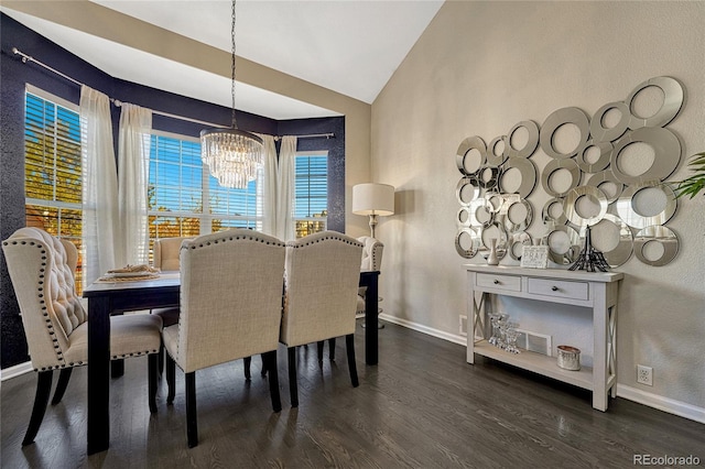 dining space featuring lofted ceiling, dark hardwood / wood-style floors, and an inviting chandelier