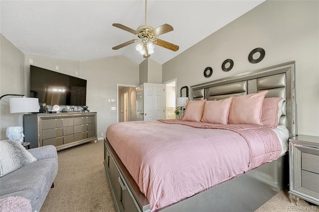 bedroom with vaulted ceiling and light colored carpet