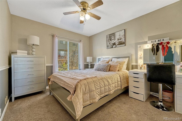 bedroom featuring light carpet and ceiling fan