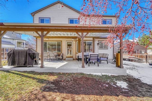 back of property with a patio area