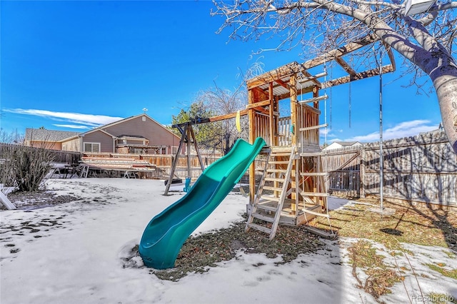 view of snow covered playground