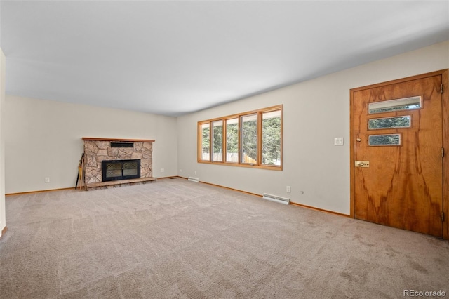 993 Fall River Rd, Idaho Springs, CO 80452 - unfurnished living room with a baseboard heating unit, baseboards, and carpet flooring