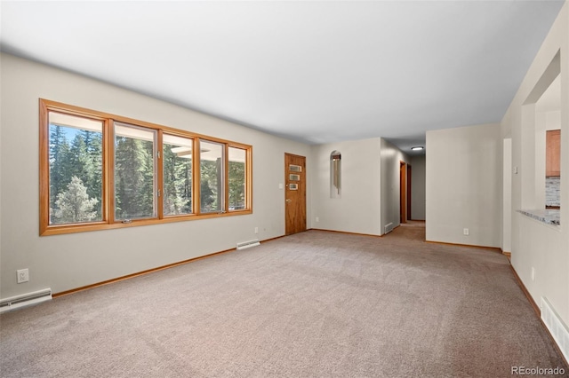 993 Fall River Rd, Idaho Springs, CO 80452 - unfurnished living room with baseboards, visible vents, baseboard heating, and light carpet