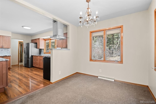 993 Fall River Rd, Idaho Springs, CO 80452 - kitchen with backsplash, stainless steel refrigerator with ice dispenser, a chandelier, and ventilation hood