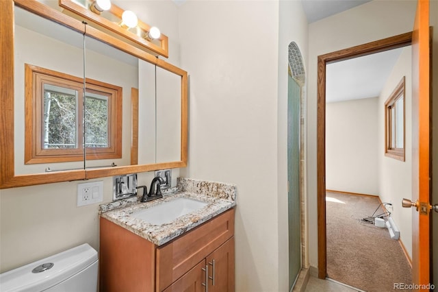 993 Fall River Rd, Idaho Springs, CO 80452 - bathroom featuring toilet and vanity