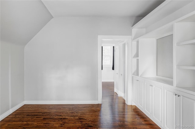 424 N Clarkson St, Denver, CO 80218 - additional living space featuring dark wood-style floors, vaulted ceiling, and baseboards