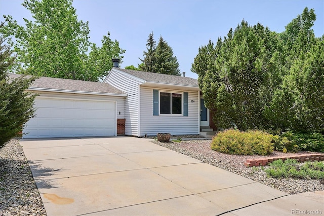 800 Park View Pl, Castle Rock, CO 80104 - view of front of home with a garage, concrete driveway, and brick siding