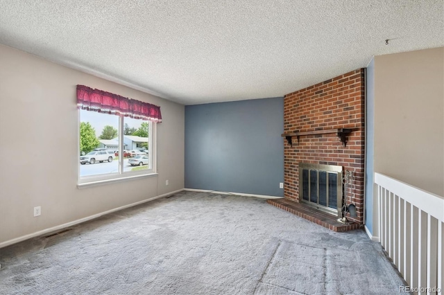 800 Park View Pl, Castle Rock, CO 80104 - unfurnished living room featuring carpet floors, a textured ceiling, a fireplace, and baseboards