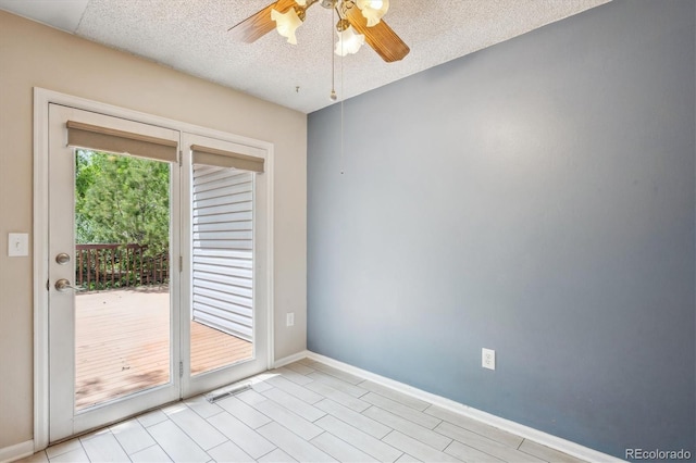 800 Park View Pl, Castle Rock, CO 80104 - spare room featuring a ceiling fan, a textured ceiling, and baseboards