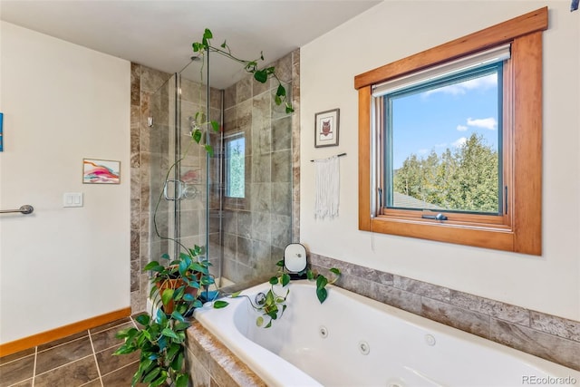 228 Glacier Ridge Rd, Alma, CO 80420 - full bath with a stall shower, a whirlpool tub, and tile patterned flooring