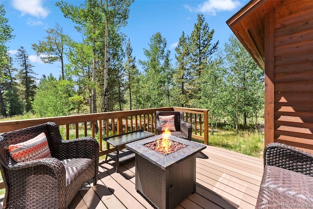 228 Glacier Ridge Rd, Alma, CO 80420 - deck with a fire pit