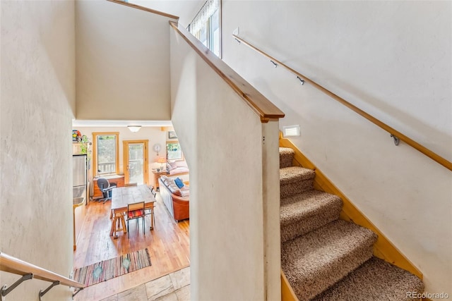 228 Glacier Ridge Rd, Alma, CO 80420 - stairway with a towering ceiling and wood finished floors
