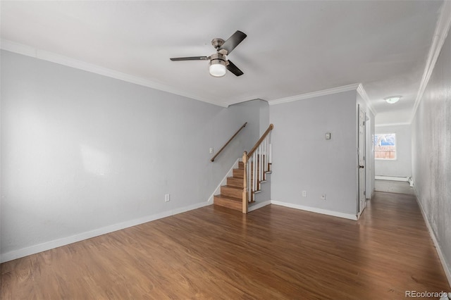 unfurnished living room with dark wood-type flooring, ornamental molding, ceiling fan, and baseboard heating