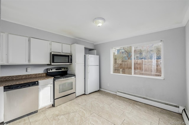 kitchen featuring white cabinetry, a baseboard heating unit, ornamental molding, and stainless steel appliances