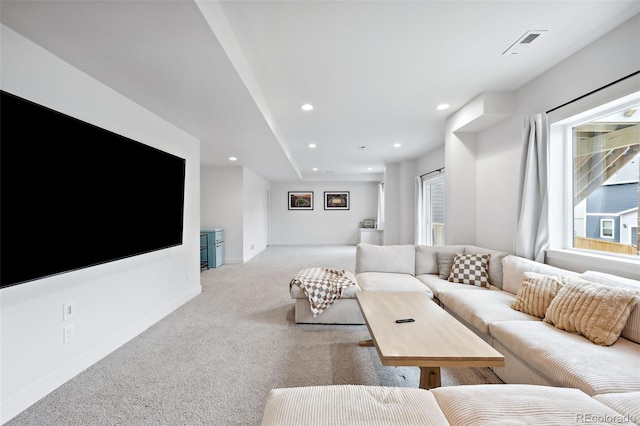 living room with light colored carpet