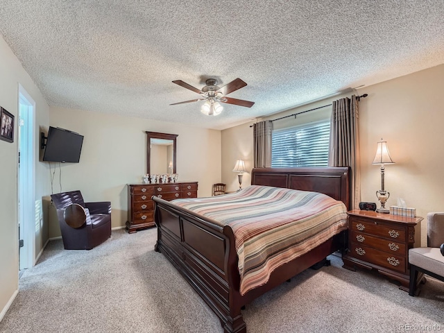 4063 S Cathay Ct, Aurora, CO 80013 - bedroom featuring light colored carpet, ceiling fan, and a textured ceiling