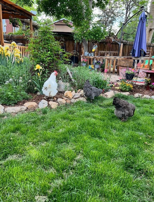 view of yard featuring fence