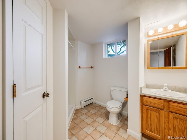 bathroom with tile patterned flooring, a baseboard heating unit, walk in shower, toilet, and vanity