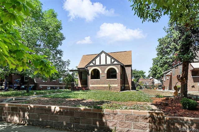 3737 Wyandot St, Denver, CO 80211 - english style home with brick siding and a shingled roof