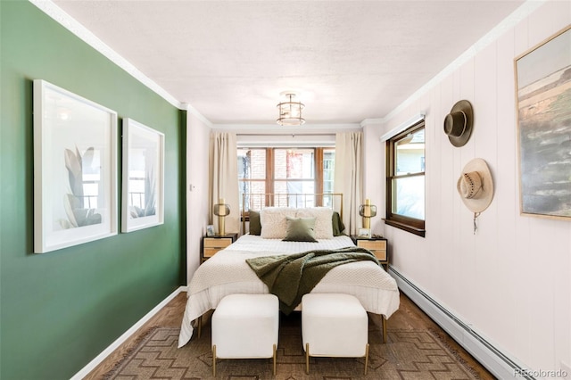 1220 S Vine St, Denver, CO 80210 - bedroom with baseboard heating, crown molding, and baseboards
