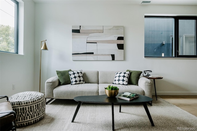1601 Park Ave Unit 214, Denver, CO 80218 - living area featuring wood finished floors and baseboards