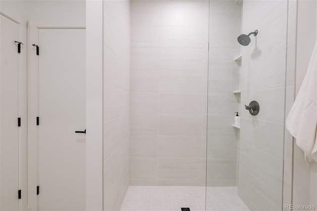 1601 Park Ave Unit 214, Denver, CO 80218 - bathroom featuring a tile shower