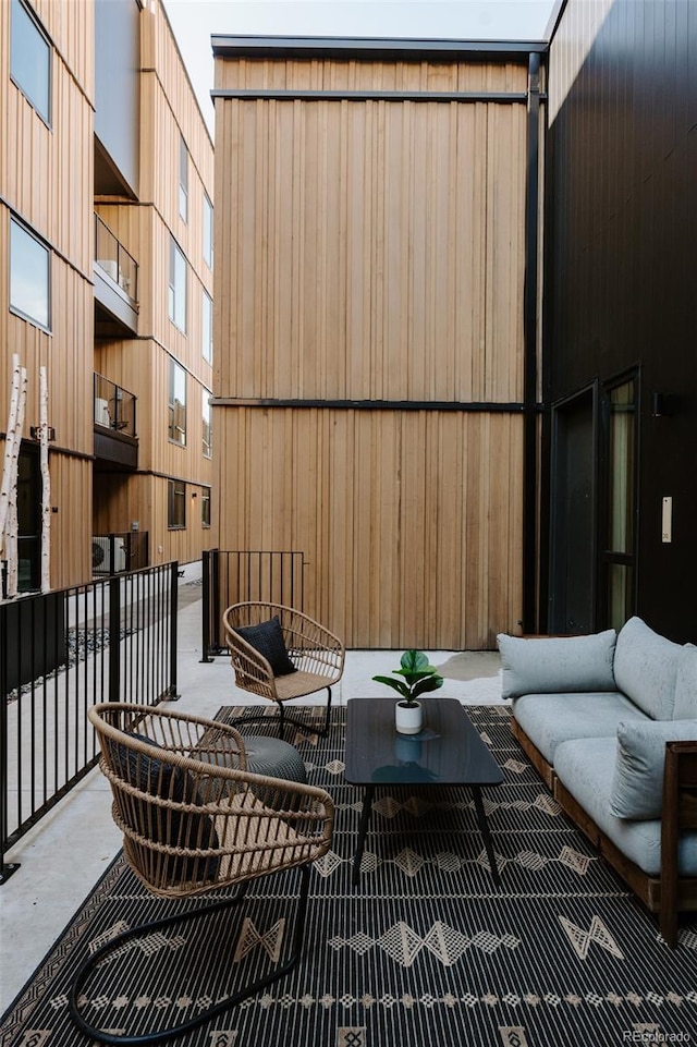 1601 Park Ave Unit 214, Denver, CO 80218 - view of patio / terrace featuring outdoor lounge area and a balcony