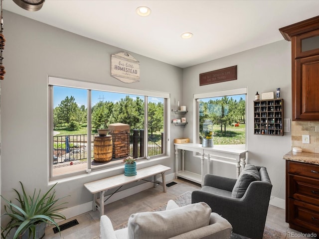 1505 Castlecombe Ln, Monument, CO 80132 - sitting room with recessed lighting and baseboards
