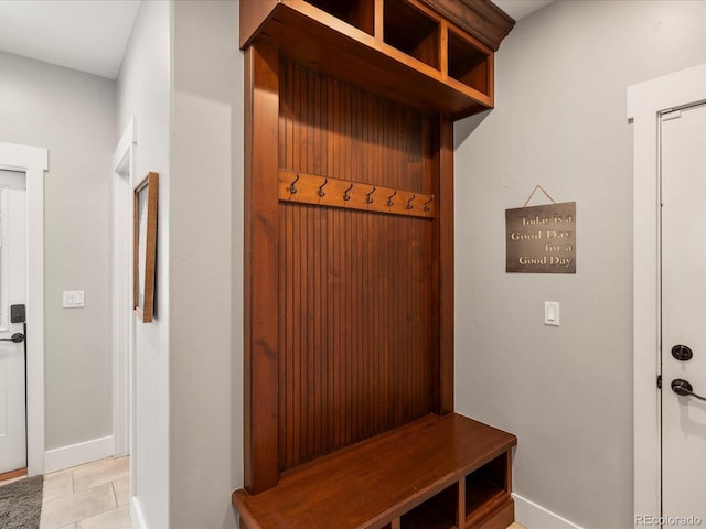 1505 Castlecombe Ln, Monument, CO 80132 - mudroom featuring light tile patterned flooring and baseboards