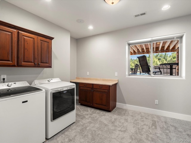 1505 Castlecombe Ln, Monument, CO 80132 - washroom featuring cabinet space, separate washer and dryer, light colored carpet, baseboards, and recessed lighting