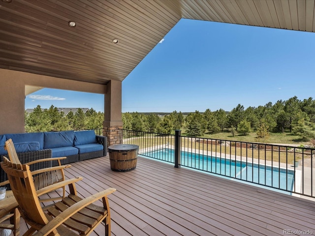 1505 Castlecombe Ln, Monument, CO 80132 - wooden deck with an outdoor hangout area