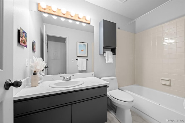 full bath with toilet, vanity, and shower / washtub combination