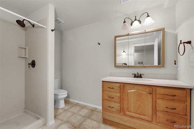 bathroom with toilet, a shower, tile patterned floors, and vanity