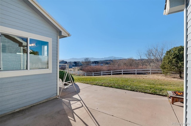 view of patio / terrace featuring a mountain view