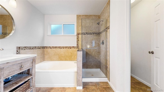 12201 N Holly Way, Brighton, CO 80602 - full bathroom with a garden tub, a stall shower, and vanity