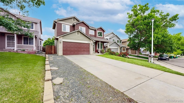 12201 N Holly Way, Brighton, CO 80602 - view of front of home featuring driveway, brick siding, and a porch