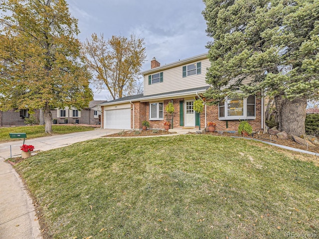 view of front of property featuring a garage and a front lawn