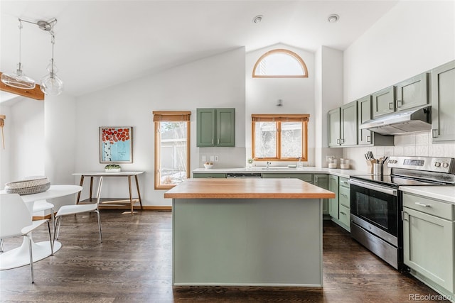 kitchen with butcher block countertops, a center island, stainless steel range with electric stovetop, under cabinet range hood, and green cabinets