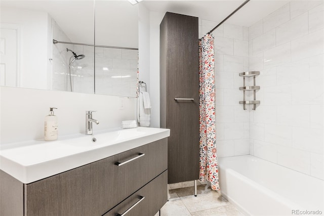 full bath featuring shower / bath combination with curtain, vanity, and tile patterned floors