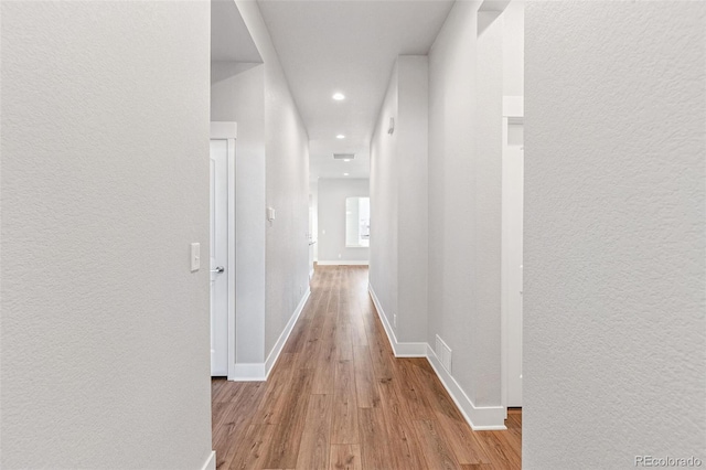 hall featuring light wood-type flooring